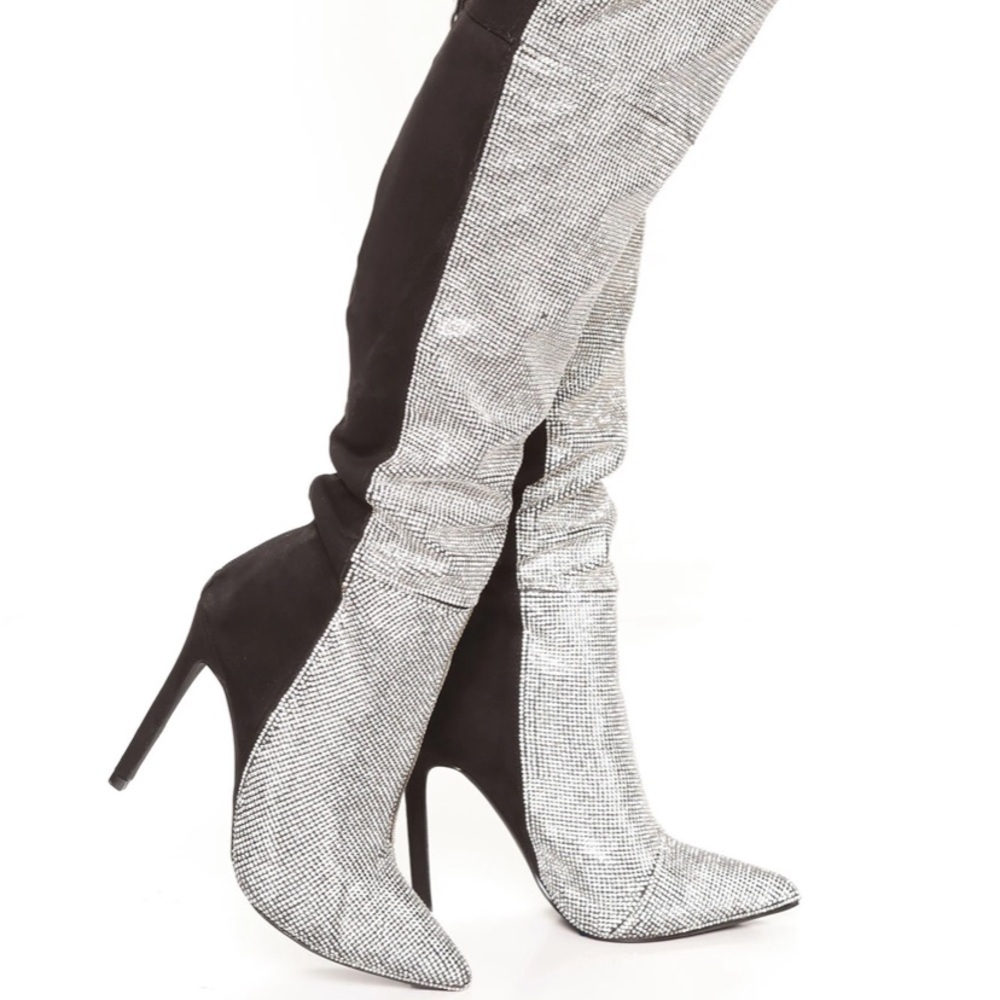 Thigh high rhinestone boots. Never worn.